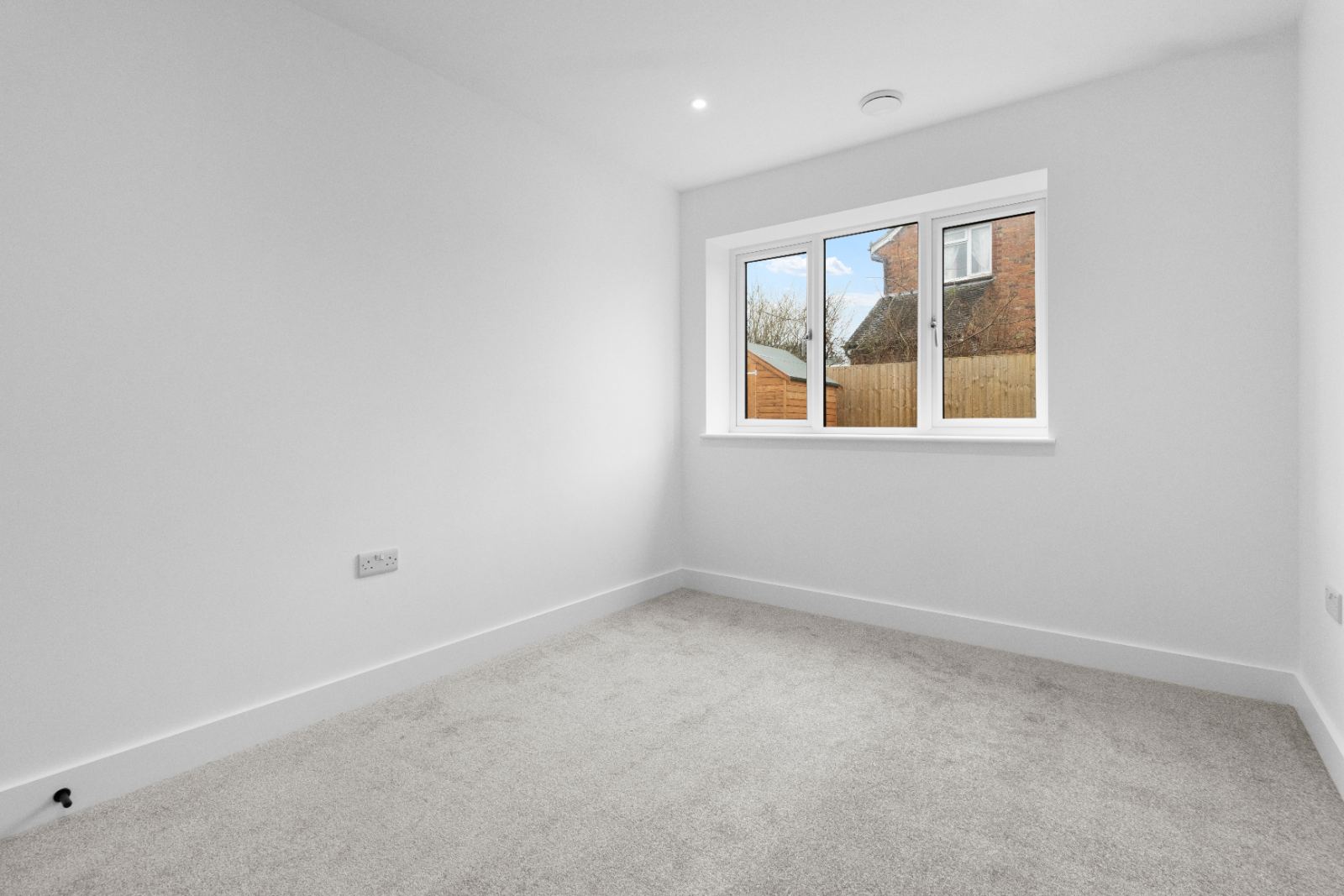 1A The Drive: bedroom with triple casement window, by Bramall Homes