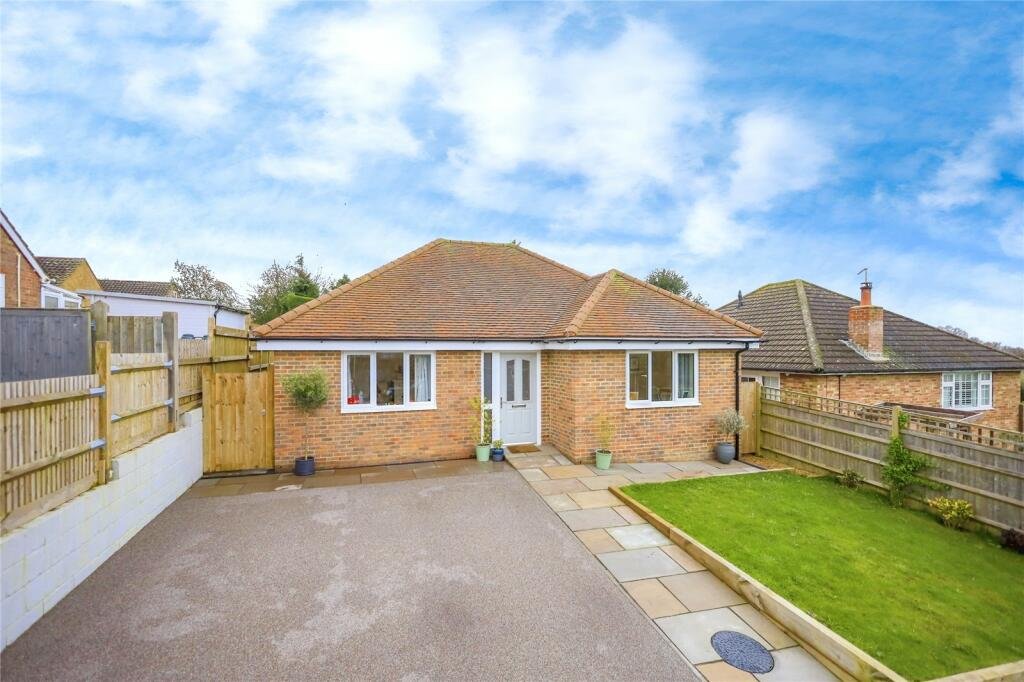 Robins Nest, Broad Oak: the completed bungalow, resin bound drive and garden, by Bramall Homes